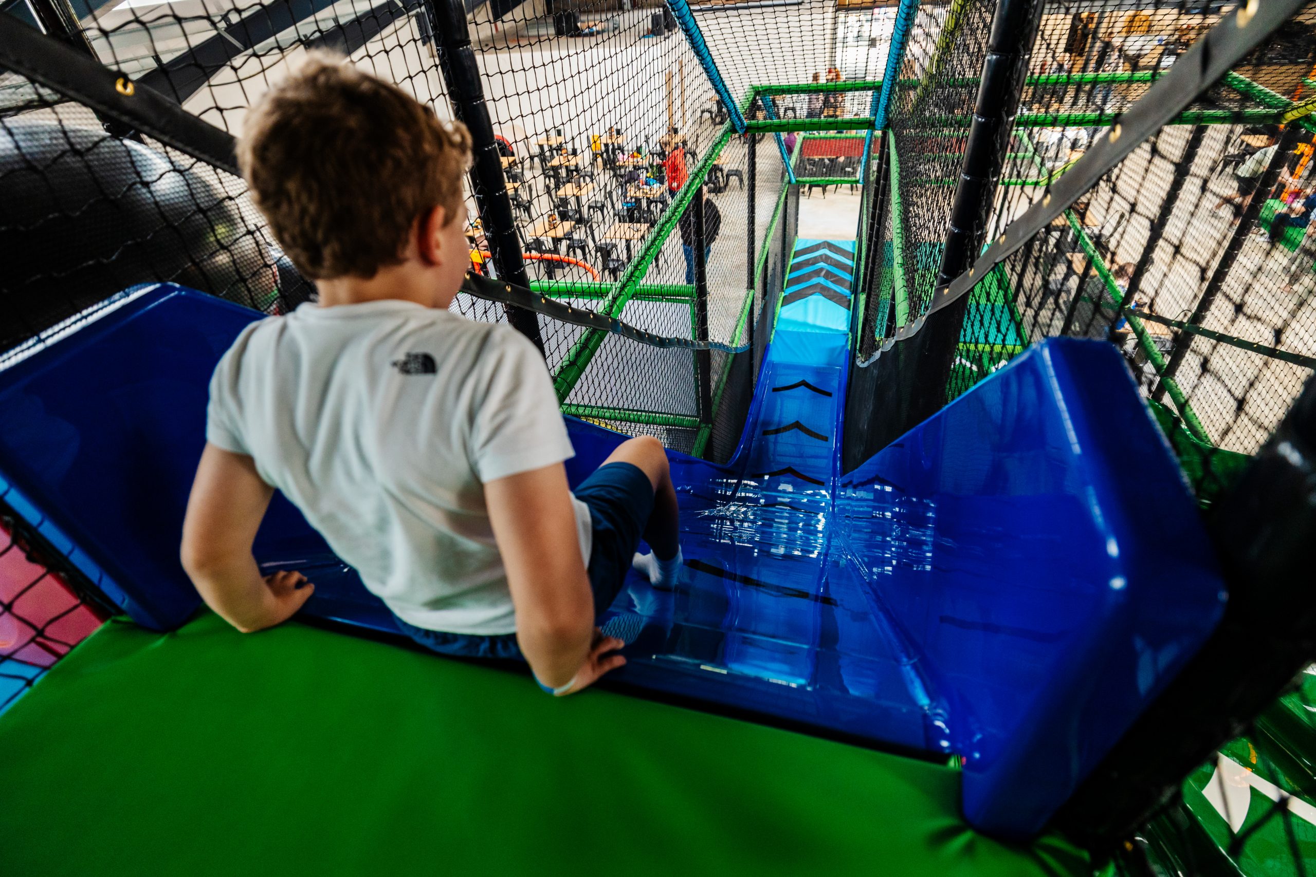 Child playing on indoor soft play equipment at Thornton Hall Country Park near Skipton