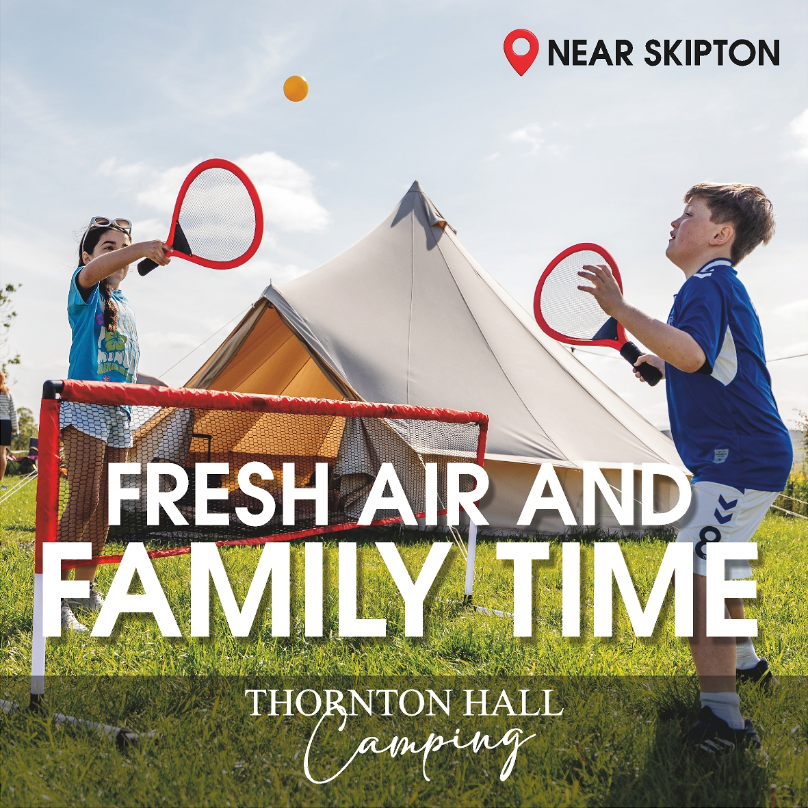 Children playing outdoor games near glamping tents at Thornton Hall Country Park camping near Skipton