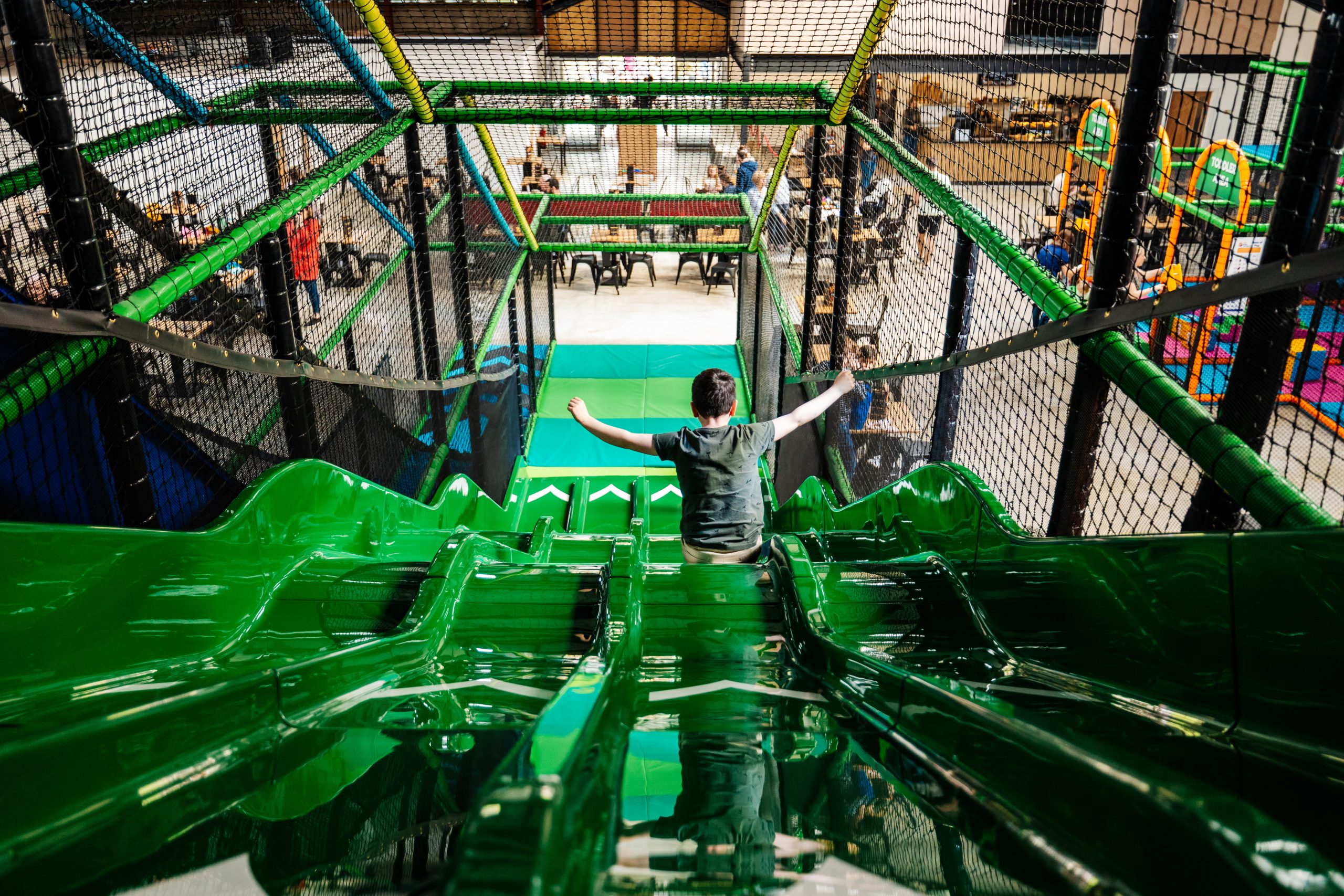 Child playing on indoor soft play equipment at Thornton Hall Country Park near Skipton